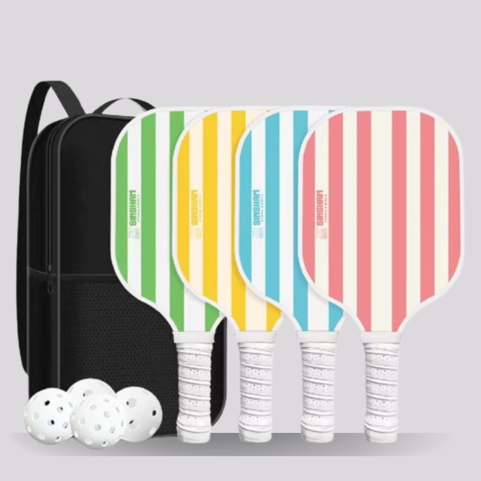 Four colorful striped pickleball paddles with a black backpack on a light gray background