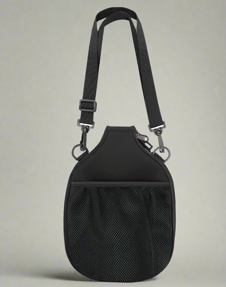 Black Pickleball Sling bag to put your paddle. Comes with a sling, and a netted pocket in front