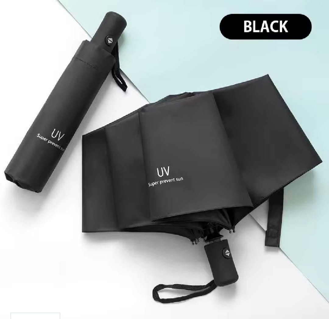 A black folding umbrella shown both folded and unfolded on a split white and pale blue background, with a black label reading BLACK in the top right. The umbrella has white text on the fabric and handle area that appears to say UV / super prevent sun.