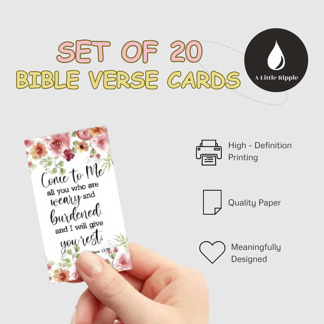 Set of 20 Bible verse cards with floral design held by a hand, on a light gray background.