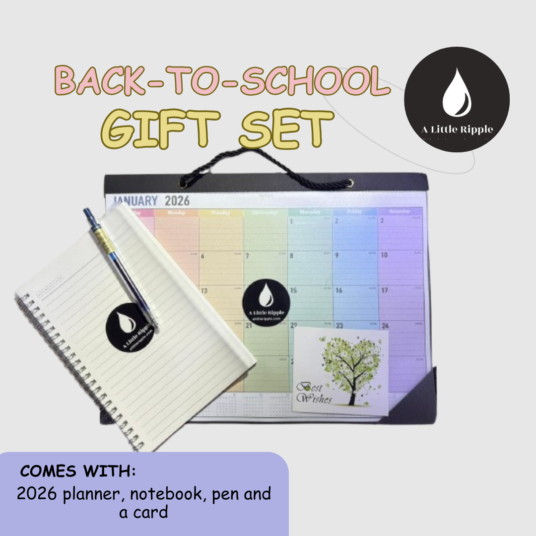 Back-to-school gift set with planner, notebook, pen, and card on a light gray background.