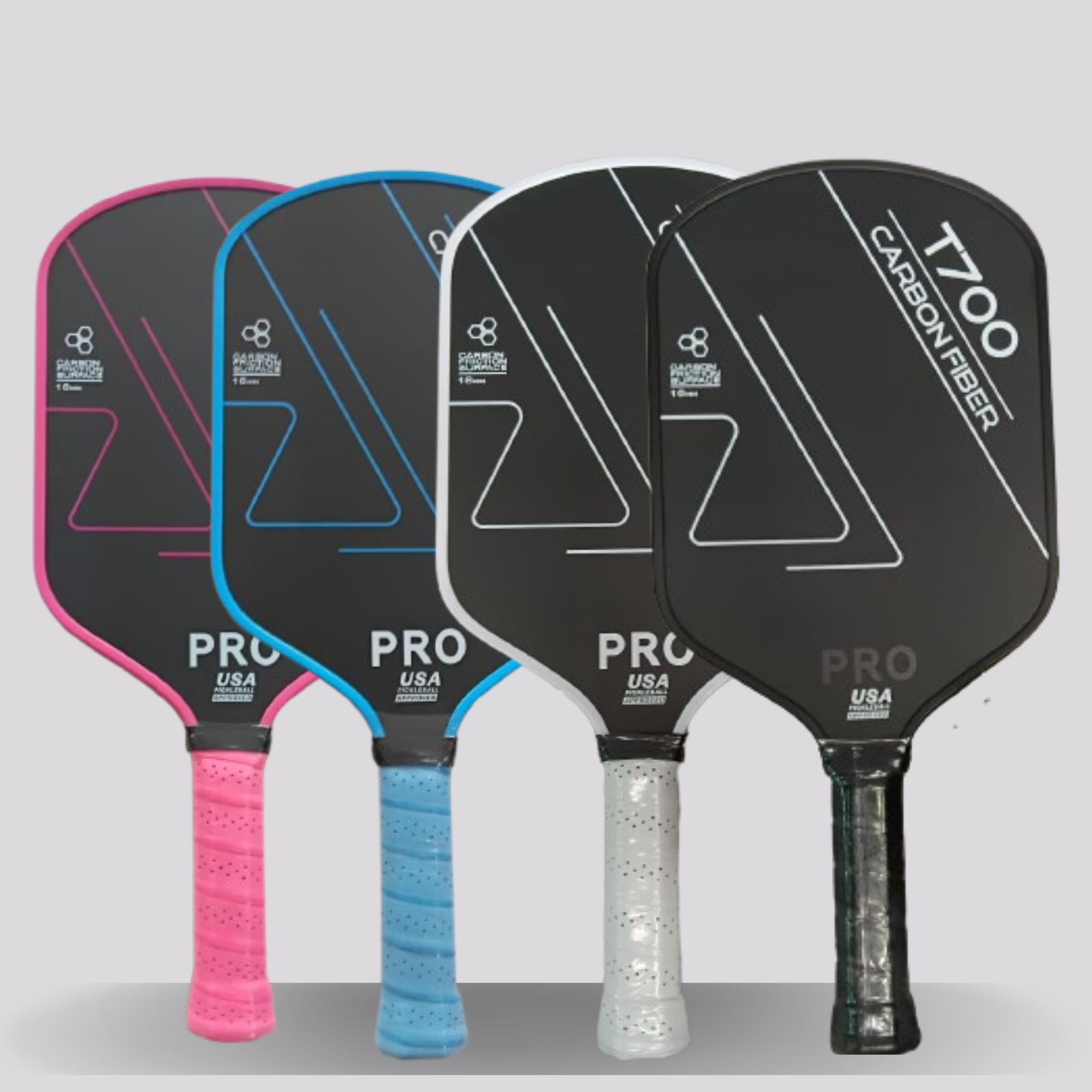 Four T700  pickleball paddles with different color handles on a gray background