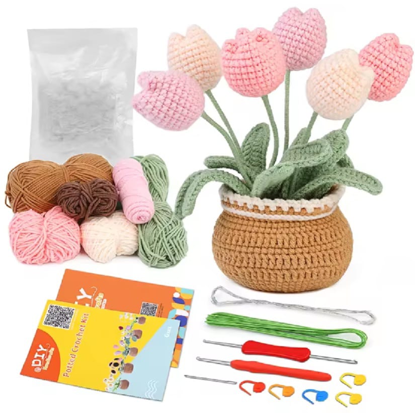 A pot of tulips crochet kit that comes with different color yarns, a step-by step video, crochet hooks, 5 safety pins and a darning needle. 