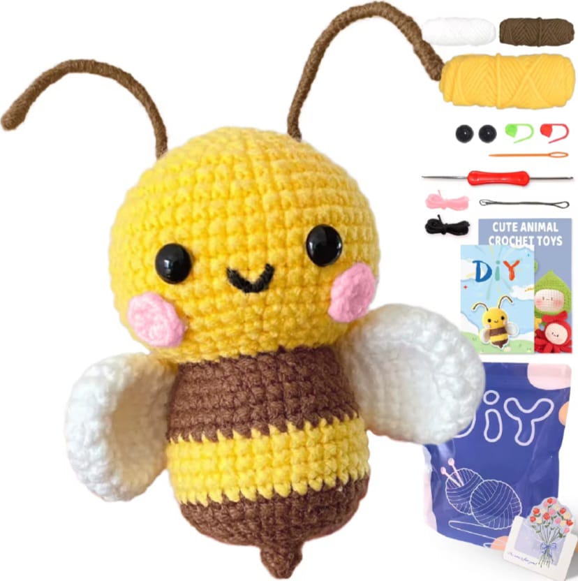 Bumblebee crochet kit that consists of 3 different coloured yarns, a pair of eyes, 2 safety pins, a darning needle, a crochet hook and a step-by-step video. 