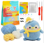 Beginner Crochet Blue Penguin with a  yellow scarf and little hat set.