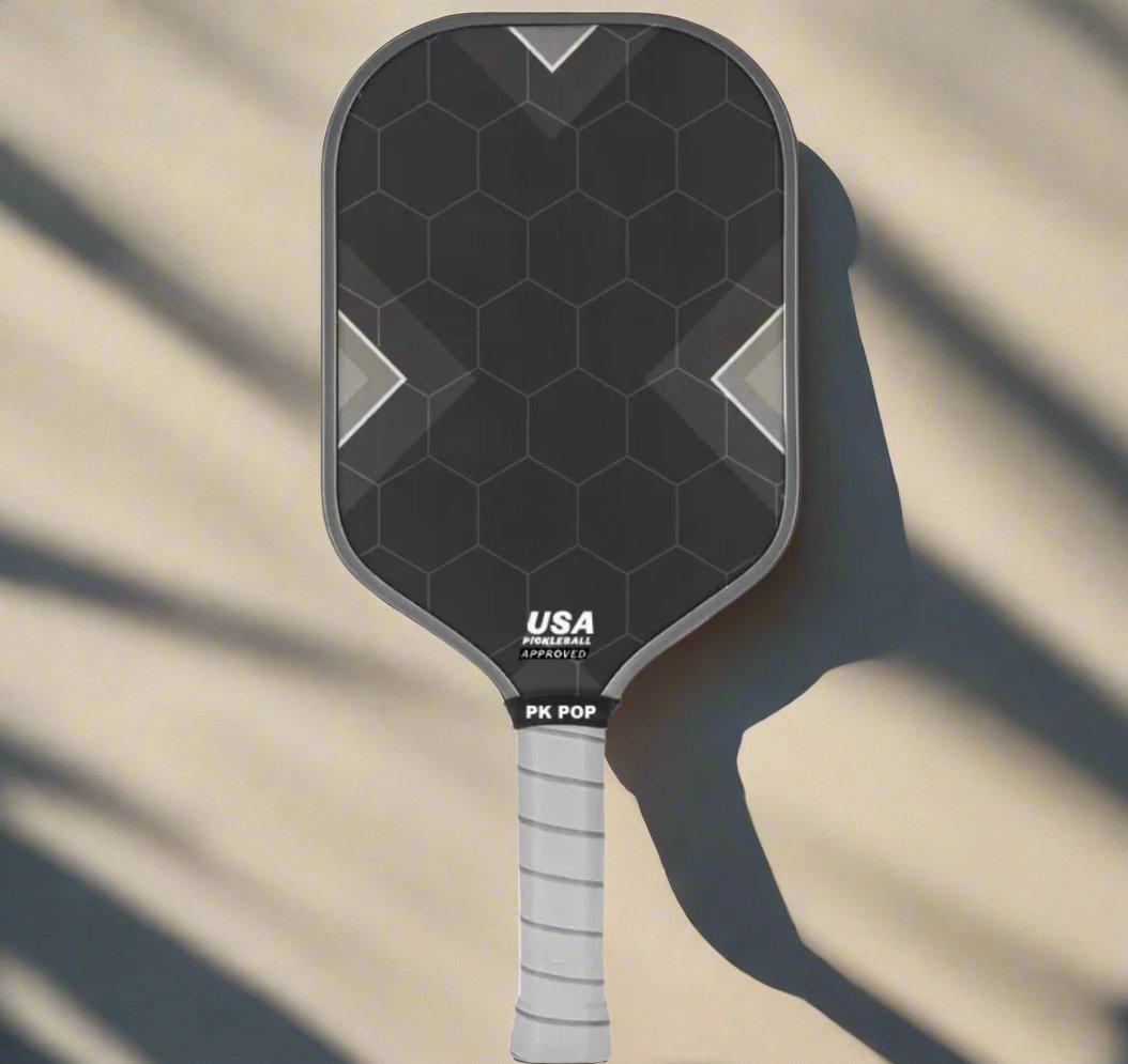 Black 3k carbon pickleball paddle for advanced players with a white handle